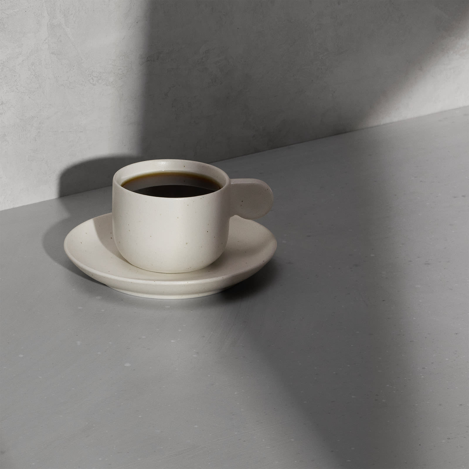 Essentialist Cup and Saucer