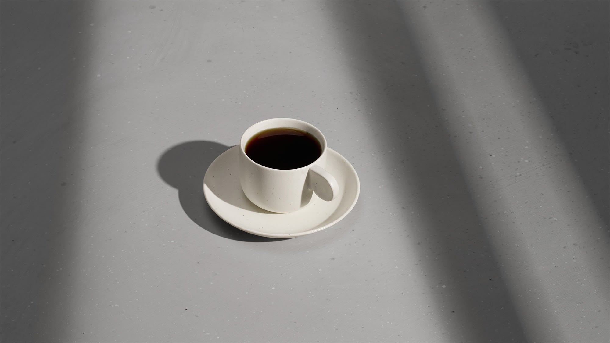 Essentialist Cup and Saucer